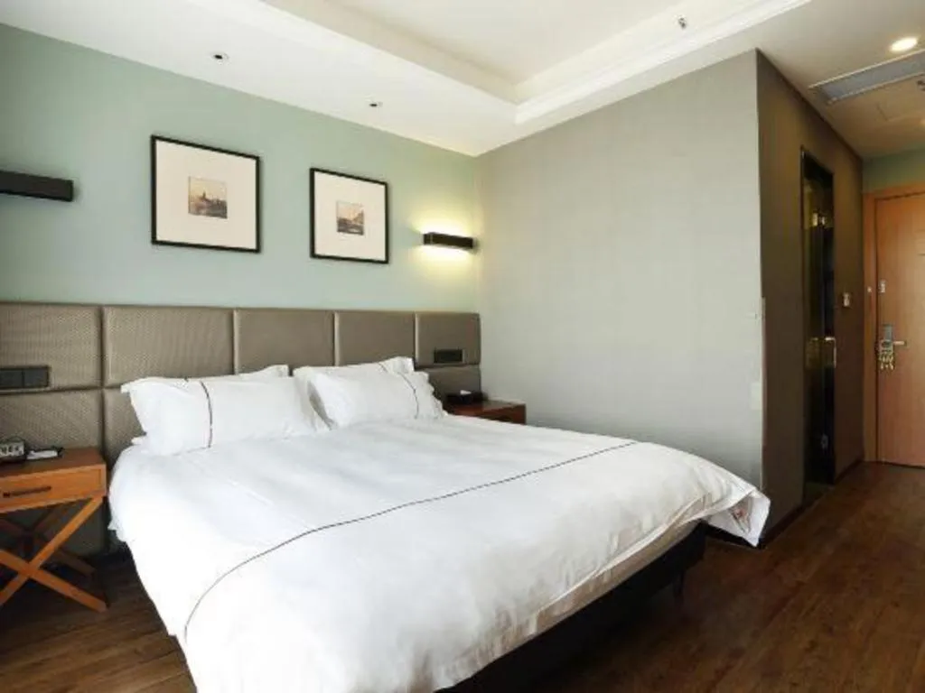 Bed in Muyra Hotel Shanghai