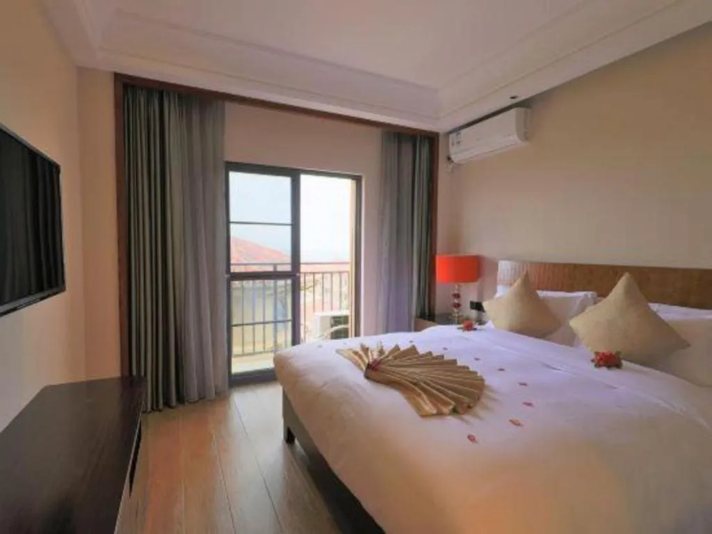 Bed in Hainan Yatai Hot Spring Hotel