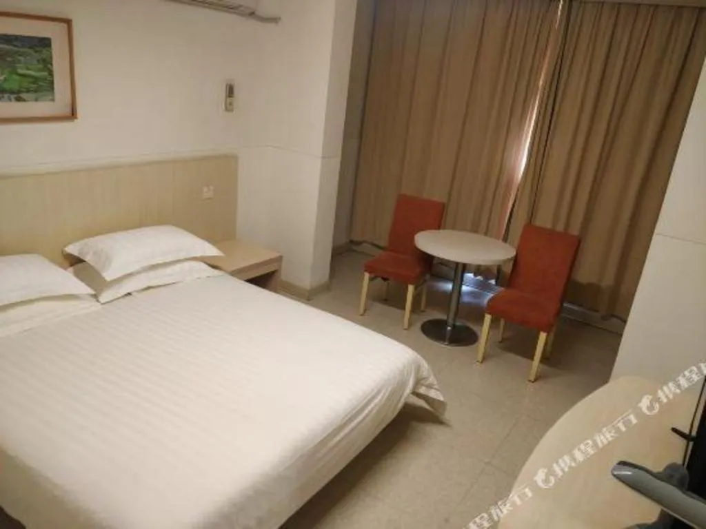 Bed in Jinjiang Inn Shanghai Baoshan Shengqiao