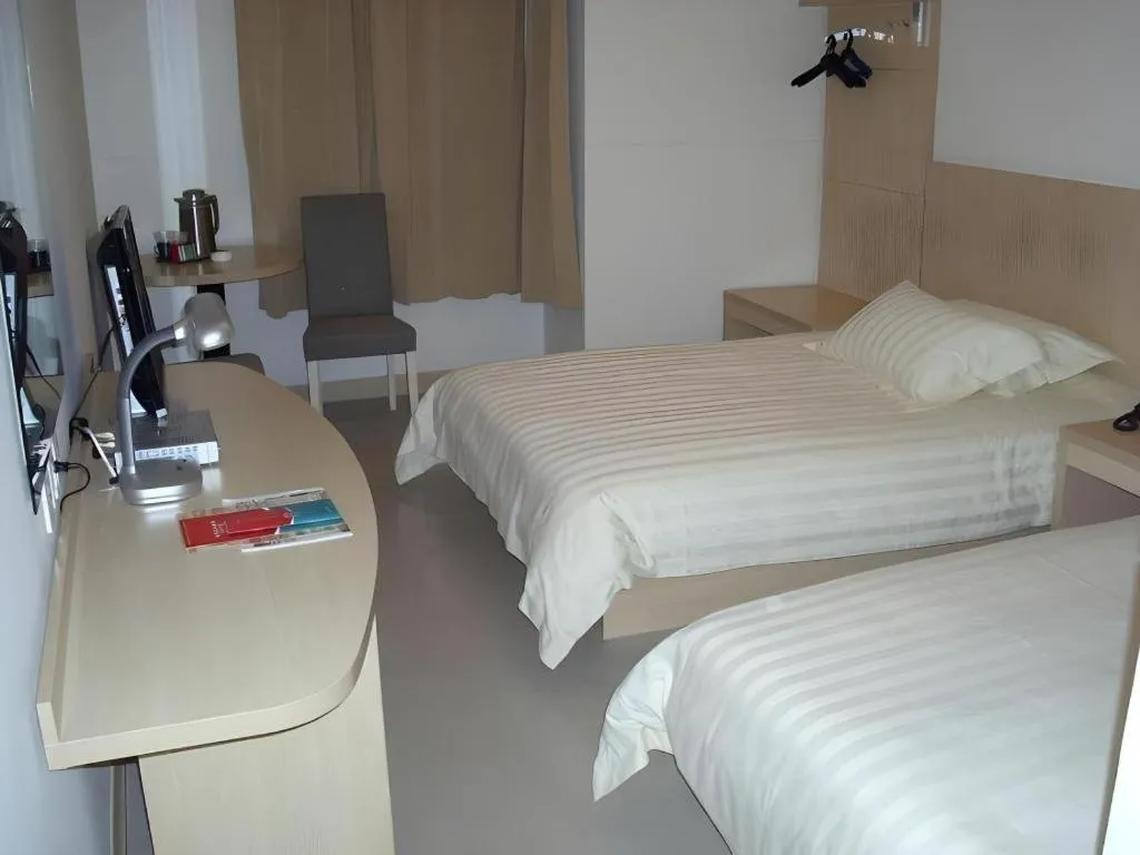 Bed in Jinjiang Inn Shanghai Baoshan Shengqiao