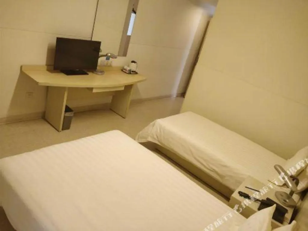 Bed in Jinjiang Inn Shanghai Baoshan Shengqiao