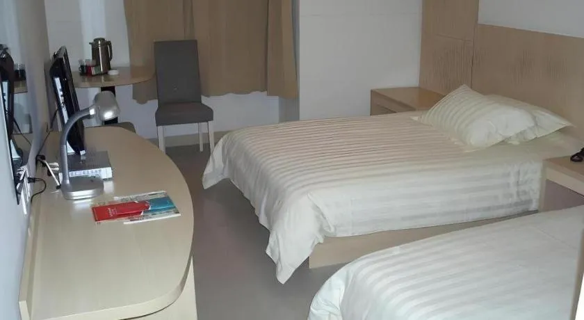 Bed in Jinjiang Inn Shanghai Baoshan Shengqiao