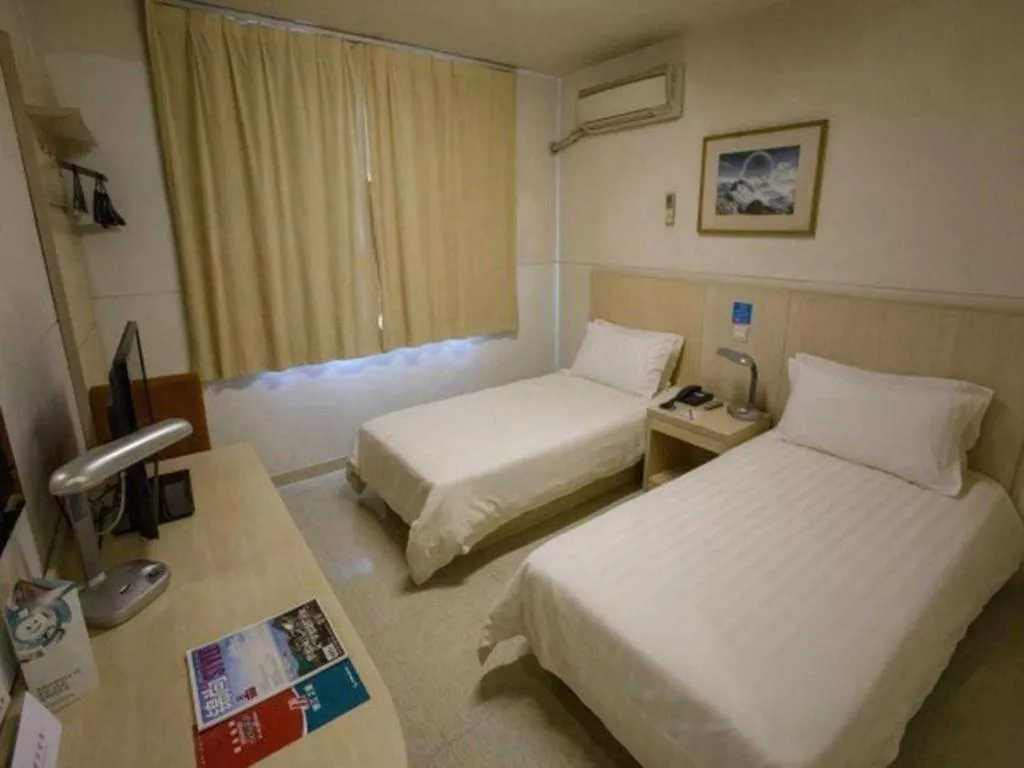 Bed in Jinjiang Inn Shanghai Baoshan Shengqiao