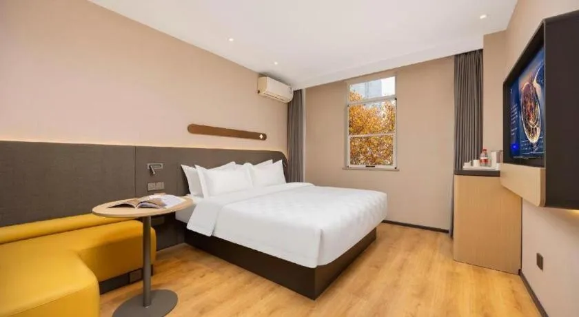 Bed in Jinjiang Inn Henan Museum Hutun Metro Station