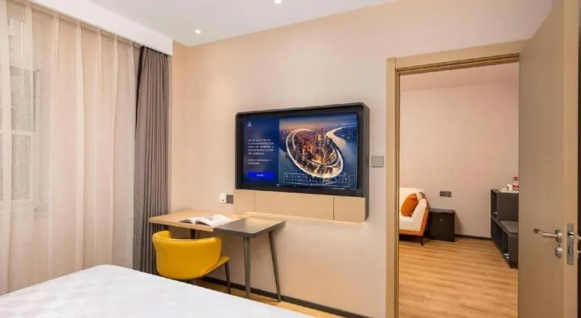 Bed in Jinjiang Inn Henan Museum Hutun Metro Station