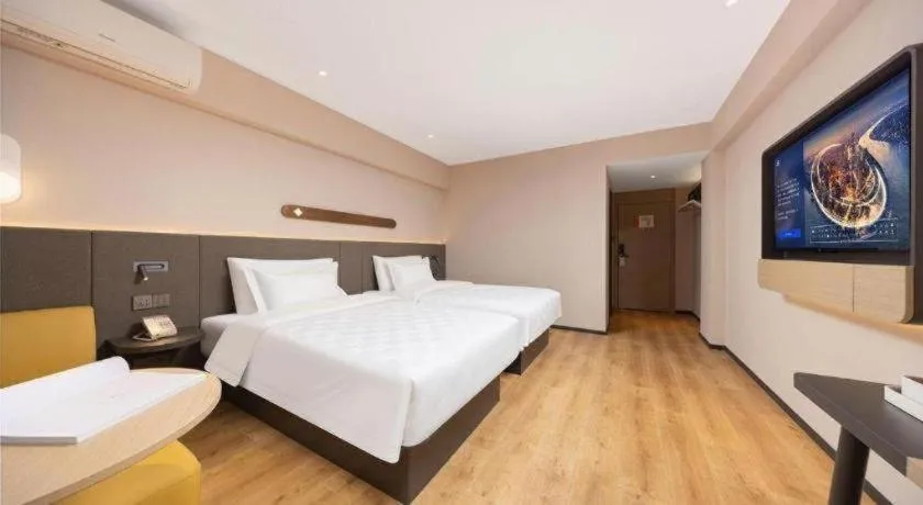 Bed in Jinjiang Inn Henan Museum Hutun Metro Station