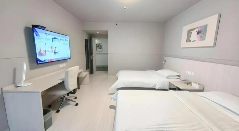 Bed in Jinjiang Inn Changzhou Global Dinosaur City Olympic Center