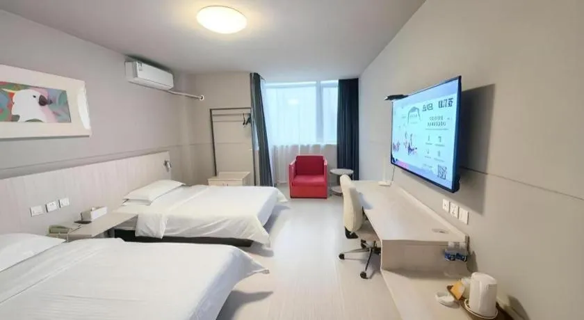 Bed in Jinjiang Inn Changzhou Global Dinosaur City Olympic Center