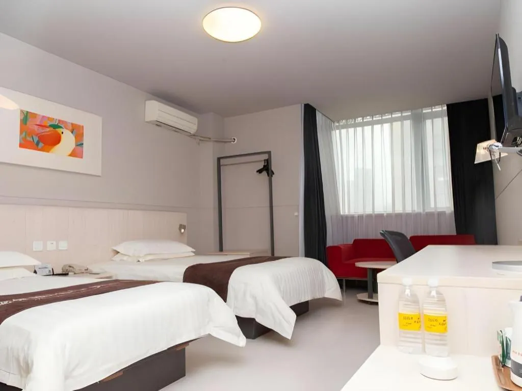 Bed in Jinjiang Inn Changzhou Global Dinosaur City Olympic Center