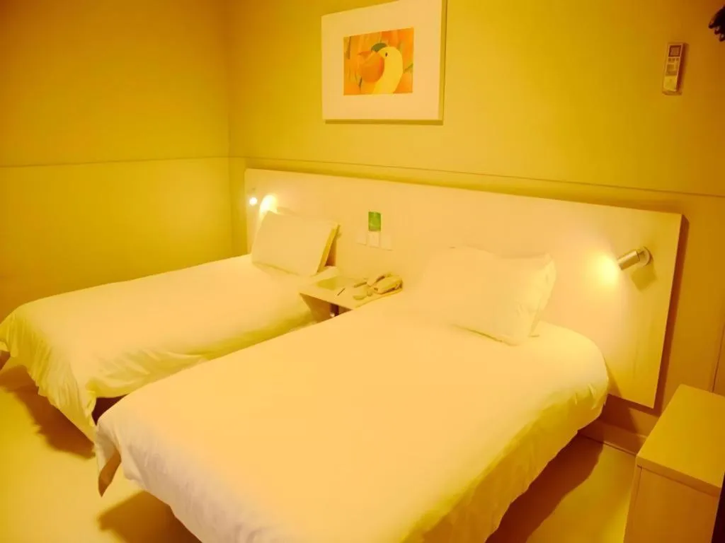 Bed in Jinjiang Inn Changzhou Global Dinosaur City Olympic Center