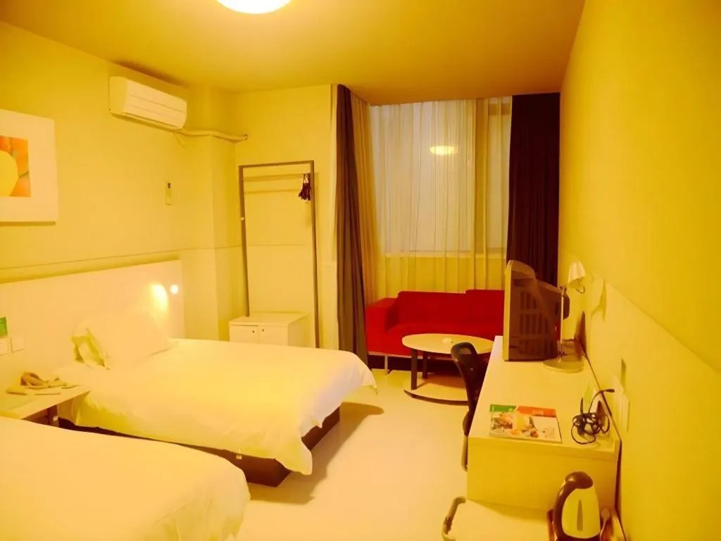 Bed in Jinjiang Inn Changzhou Global Dinosaur City Olympic Center