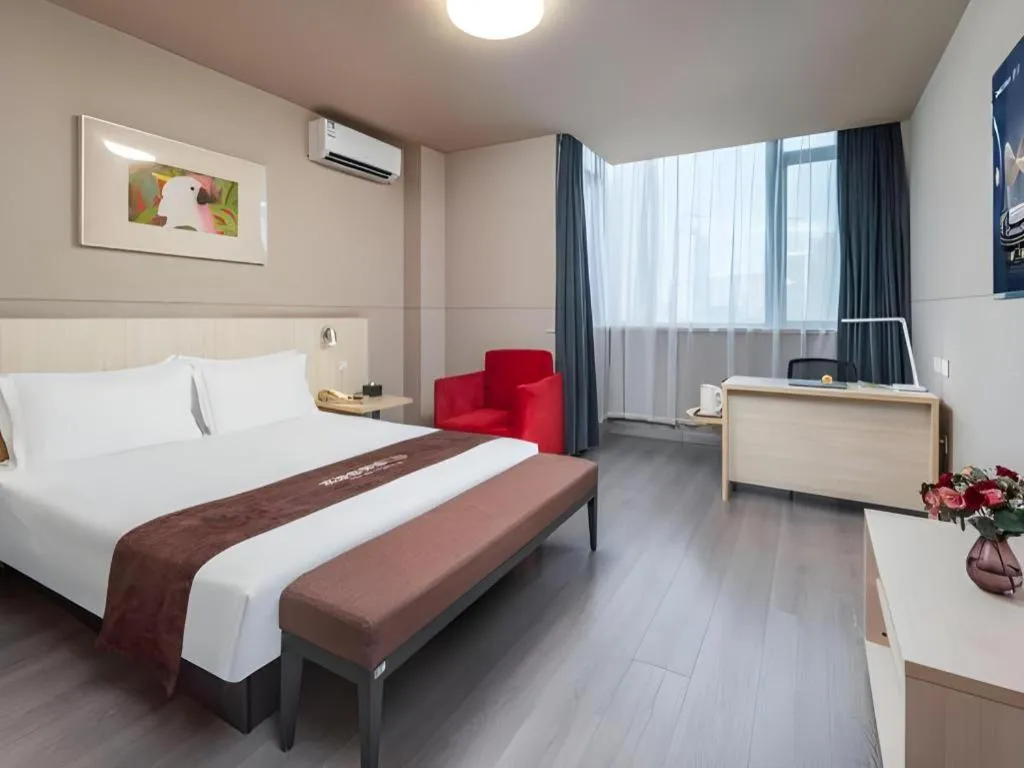 Bed in Jinjiang Inn Changzhou Global Dinosaur City Olympic Center