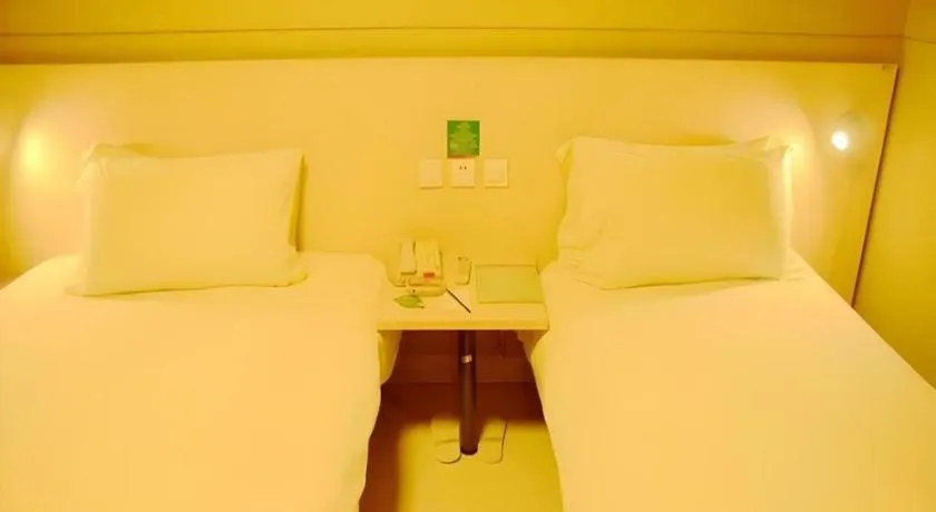 Bed in Jinjiang Inn Changzhou Global Dinosaur City Olympic Center