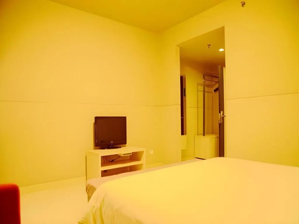 Bed in Jinjiang Inn Changzhou Global Dinosaur City Olympic Center