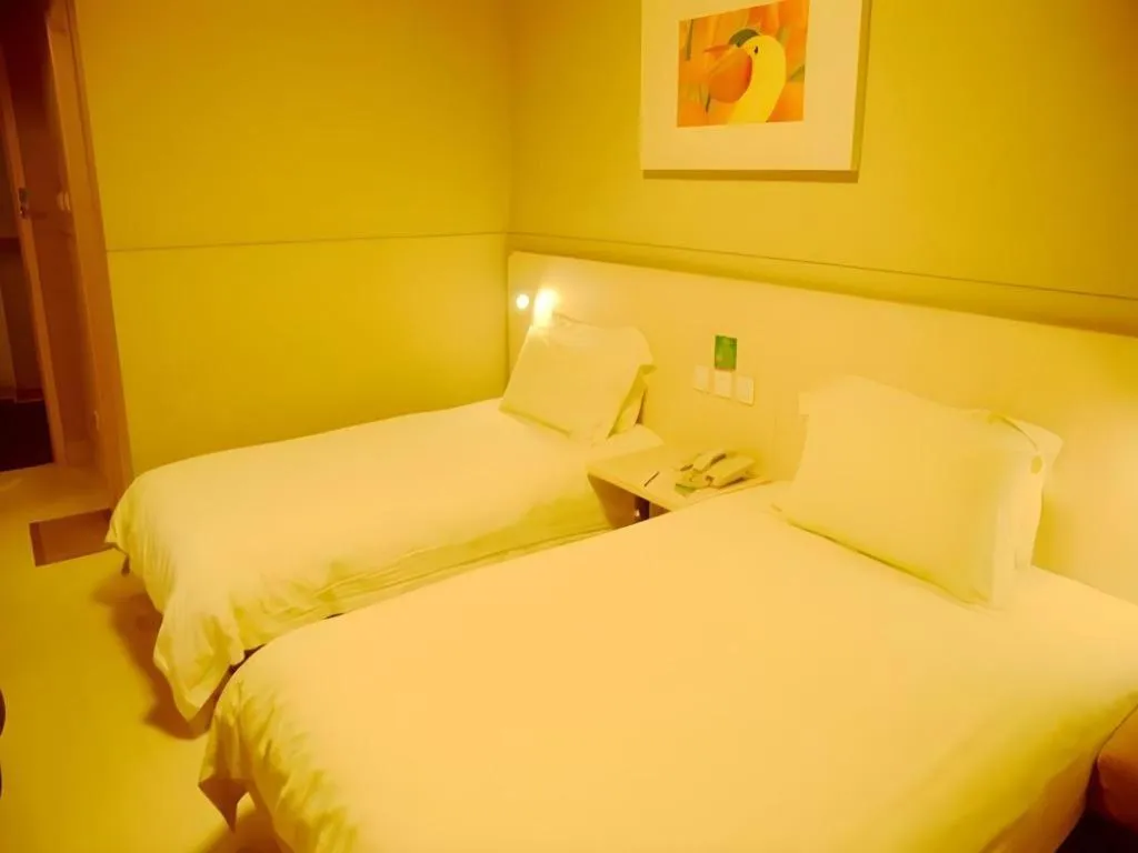 Bed in Jinjiang Inn Changzhou Global Dinosaur City Olympic Center