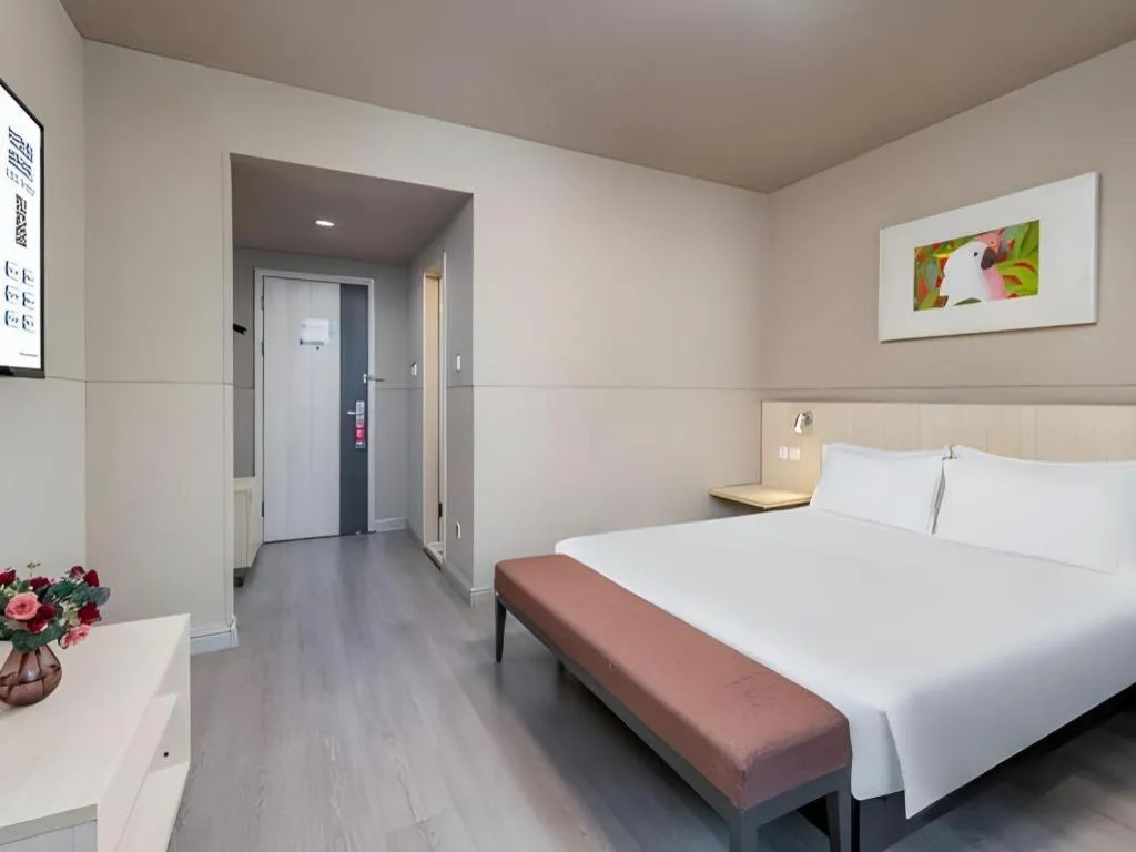 Bed in Jinjiang Inn Changzhou Global Dinosaur City Olympic Center