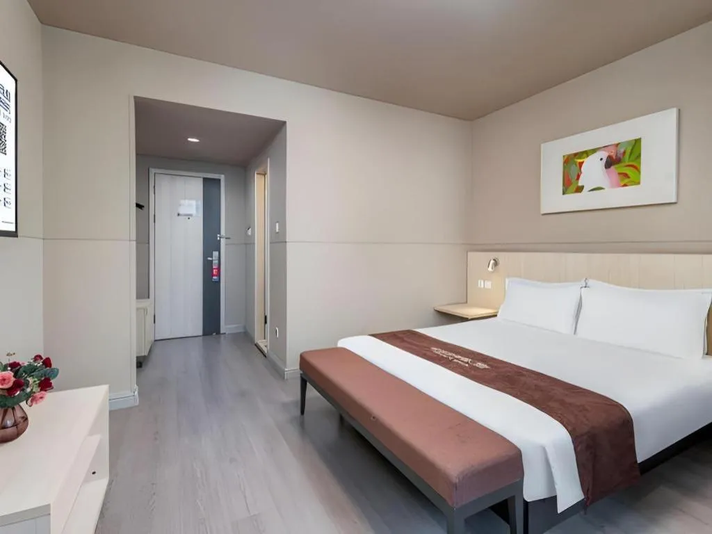 Bed in Jinjiang Inn Changzhou Global Dinosaur City Olympic Center