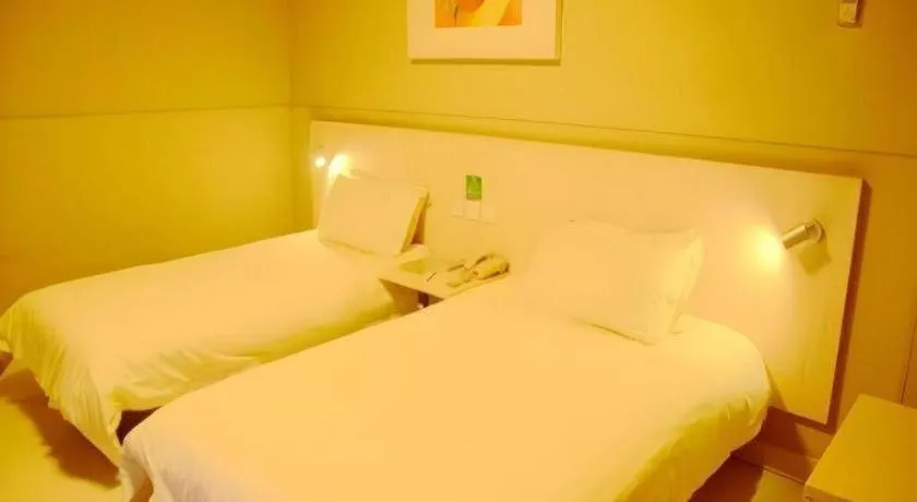 Bed in Jinjiang Inn Changzhou Global Dinosaur City Olympic Center