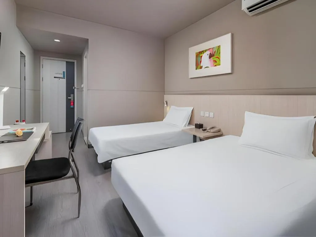 Bed in Jinjiang Inn Changzhou Global Dinosaur City Olympic Center