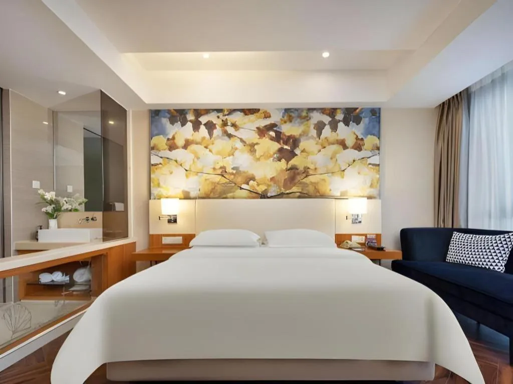 Bed in Jinjiang Metropolo Hotel - Taizhou Wanda Plaza
