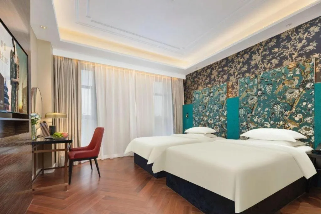 Bed in Jinjiang Metropolo Hotel - Taizhou Wanda Plaza