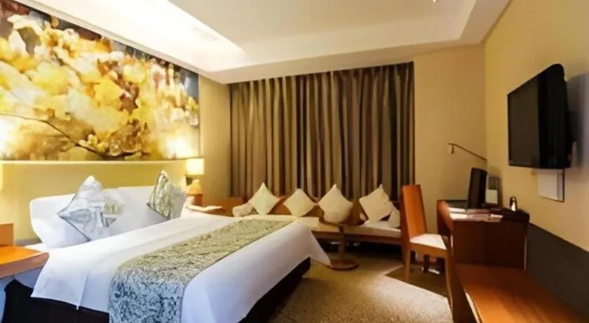 Bed in Jinjiang Metropolo Hotel - Taizhou Wanda Plaza