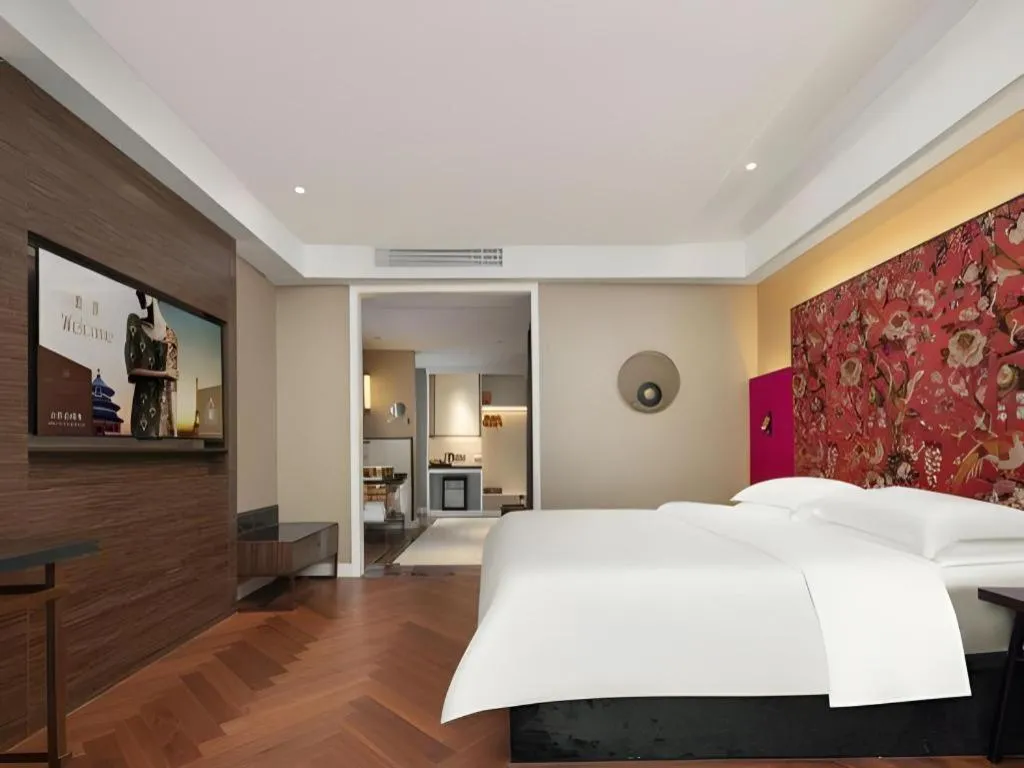 Bed in Jinjiang Metropolo Hotel - Taizhou Wanda Plaza
