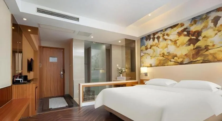 Bed in Jinjiang Metropolo Hotel - Taizhou Wanda Plaza