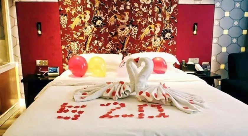 Bed in Jinjiang Metropolo Hotel - Taizhou Wanda Plaza