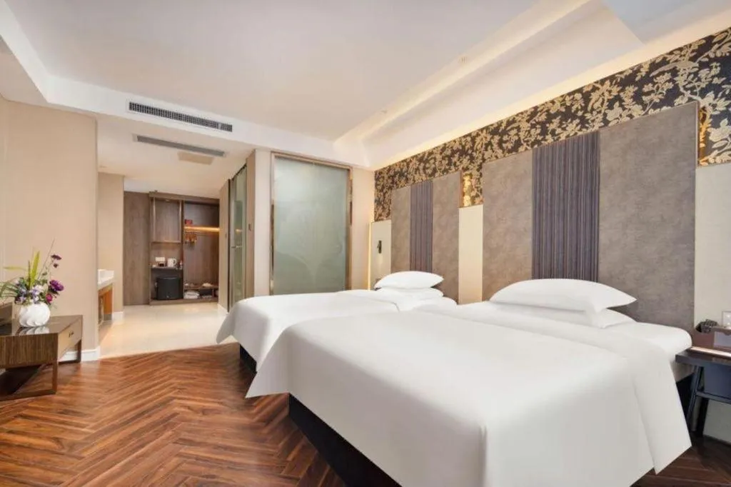 Bed in Jinjiang Metropolo Hotel - Taizhou Wanda Plaza