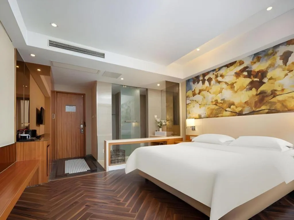 Bed in Jinjiang Metropolo Hotel - Taizhou Wanda Plaza