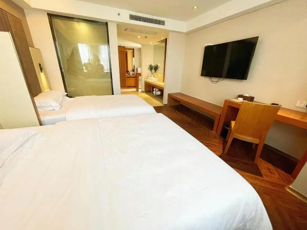 Bed in Jinjiang Metropolo Hotel - Taizhou Wanda Plaza