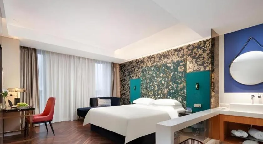 Bed in Jinjiang Metropolo Hotel - Taizhou Wanda Plaza