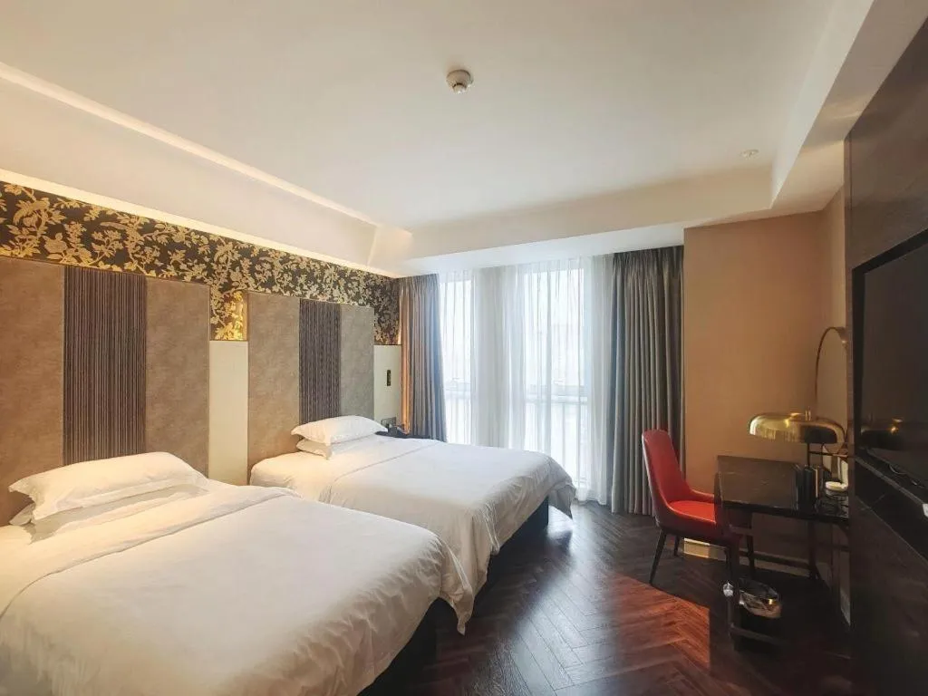 Bed in Jinjiang Metropolo Hotel - Taizhou Wanda Plaza