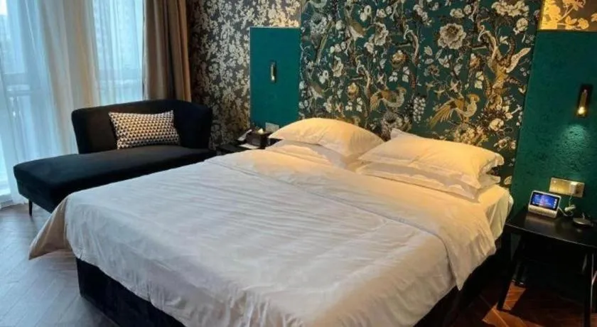 Bed in Jinjiang Metropolo Hotel - Taizhou Wanda Plaza