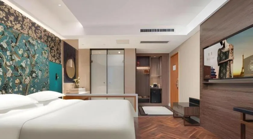 Bed in Jinjiang Metropolo Hotel - Taizhou Wanda Plaza