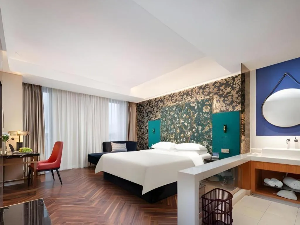 Bed in Jinjiang Metropolo Hotel - Taizhou Wanda Plaza