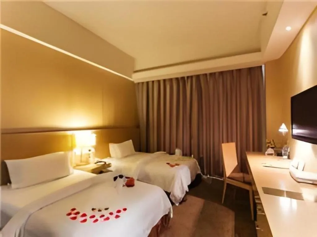 Bed in Jinjiang Metropolo Hotel - Langfang Wanda Plaza