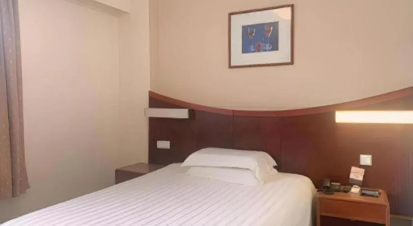 Bed in Jinjiang Inn Shanghai North Bund Yangpu Bridge Branch