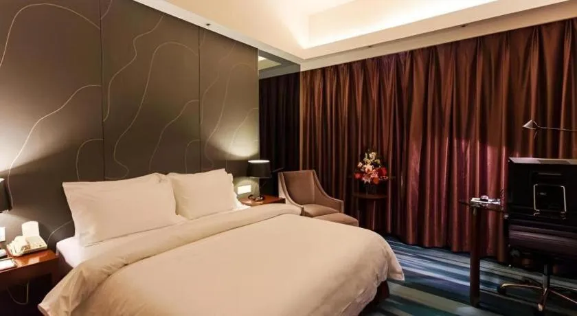 Bed in Metropolo Hotel Shijiazhuang Yuhua Wanda Plaza