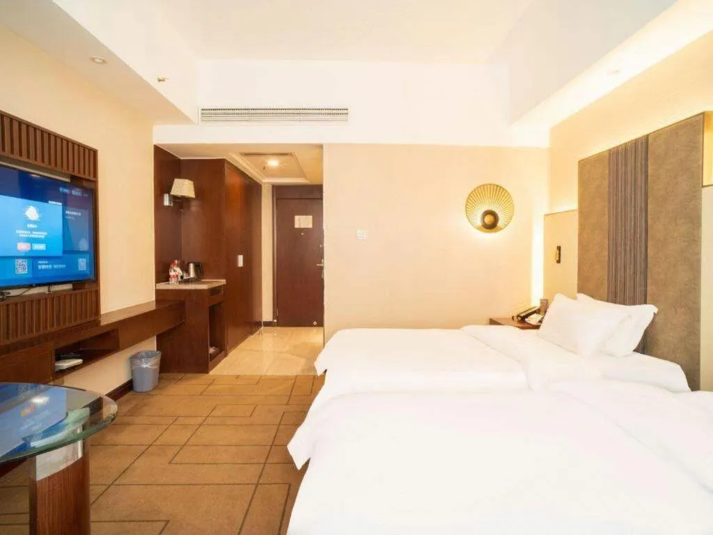 Bed in Metropolo Hotel Shijiazhuang Yuhua Wanda Plaza