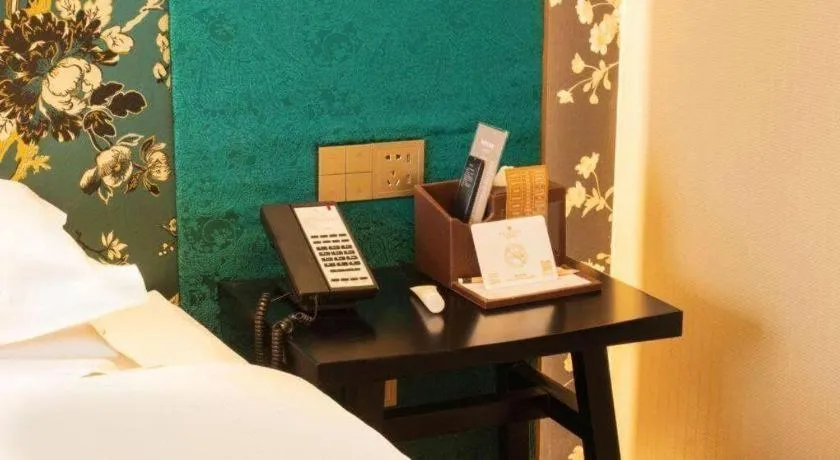 Bed in Metropolo Hotel Shijiazhuang Yuhua Wanda Plaza