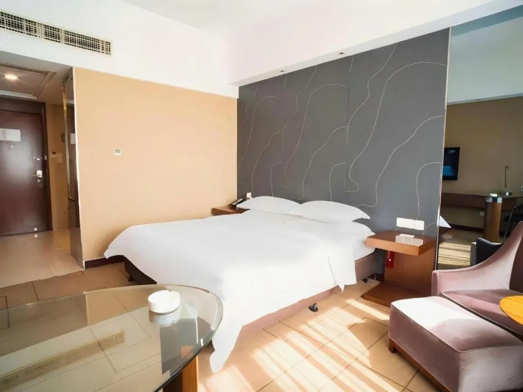 Bed in Metropolo Hotel Shijiazhuang Yuhua Wanda Plaza