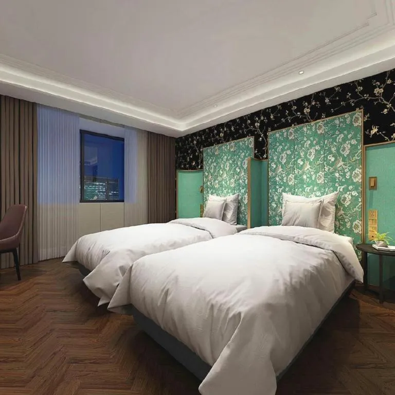 Bed in Metropolo Hotel Shijiazhuang Yuhua Wanda Plaza