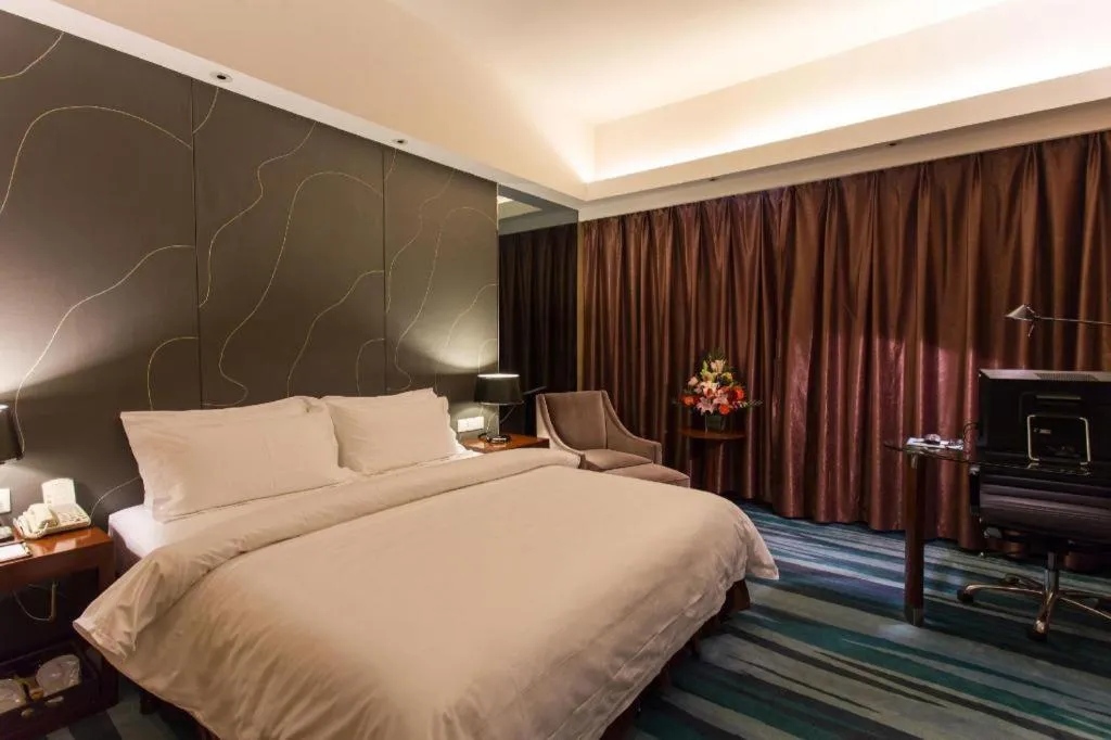 Bed in Metropolo Hotel Shijiazhuang Yuhua Wanda Plaza