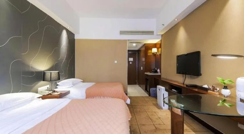 Bed in Metropolo Hotel Shijiazhuang Yuhua Wanda Plaza