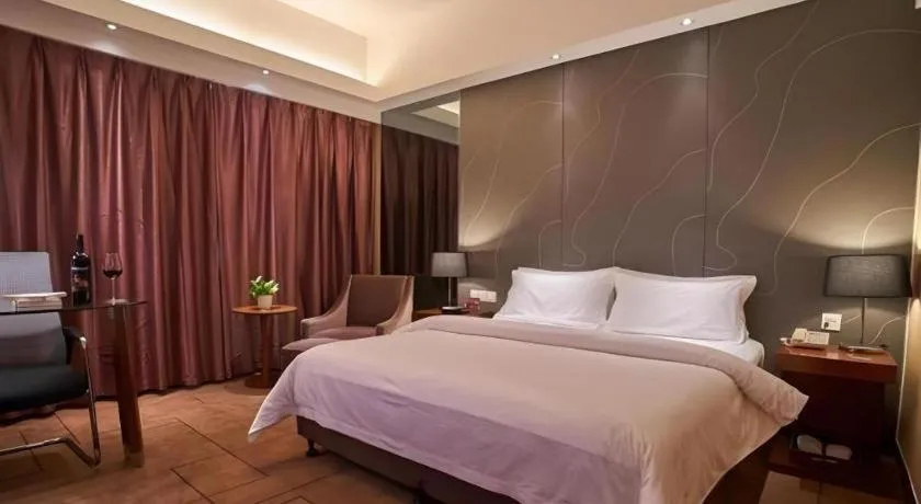 Bed in Metropolo Hotel Shijiazhuang Yuhua Wanda Plaza