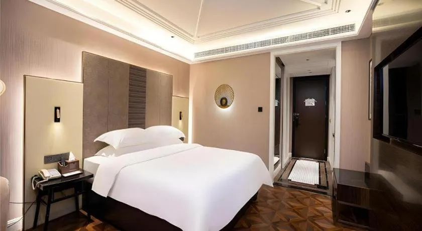 Bed in Metropolo Hotel Shijiazhuang Yuhua Wanda Plaza