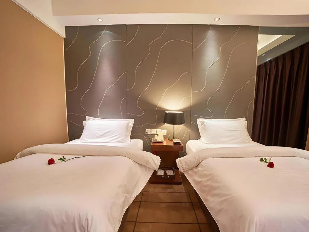 Bed in Metropolo Hotel Shijiazhuang Yuhua Wanda Plaza