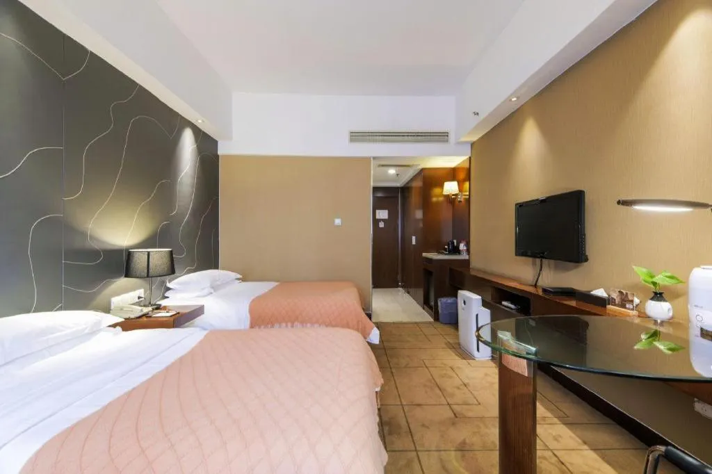 Bed in Metropolo Hotel Shijiazhuang Yuhua Wanda Plaza